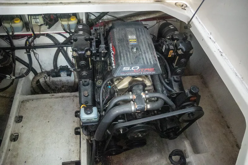 Slide: The Image of Engine compartment of a 1999 Bayliner 3055 Ciera Sunbridge with MerCruiser 5.0L engine. - 37