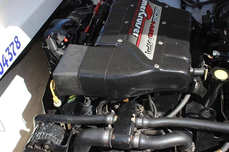 Slide: The Image of Engine of 2000 Fountain 32 Fever boat, featuring MerCruiser 502 MAG MPI. - 15