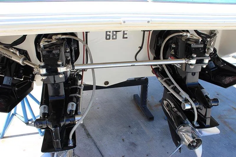 Slide: The Image of Rear view of a 2000 Fountain 32 Fever boat's dual outboard motors. - 17