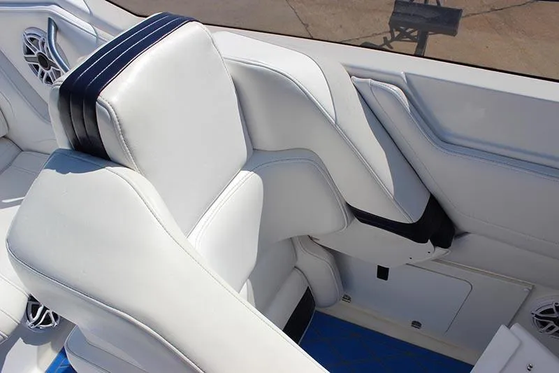 Slide: The Image of White leather seating in a 2000 Fountain 32 Fever boat interior. - 29