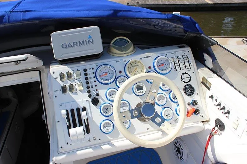 Slide: The Image of Control panel of a 2000 Fountain 32 Fever boat with Garmin navigation system. - 3