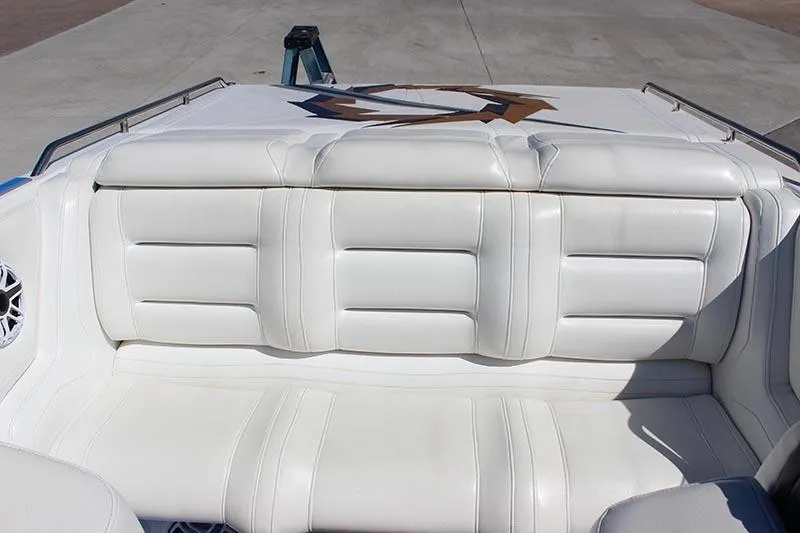 Slide: The Image of White leather seating on a 2000 Fountain 32 Fever boat, showcasing luxury and comfort. - 34