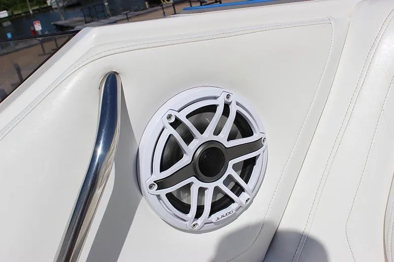 Slide: The Image of White JL Audio speaker on a 2000 Fountain 32 Fever boat interior. - 39