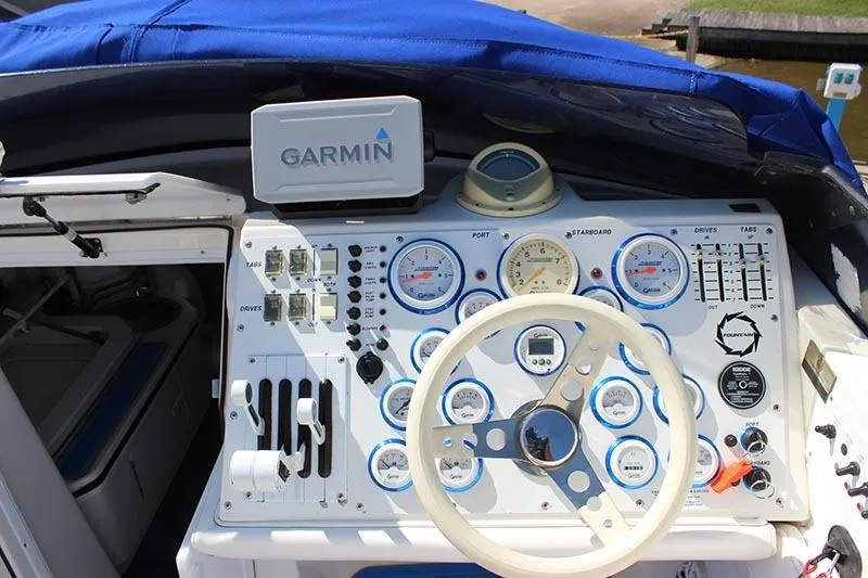Slide: The Image of Cockpit of 2000 Fountain 32 Fever boat with Garmin navigation system. - 4