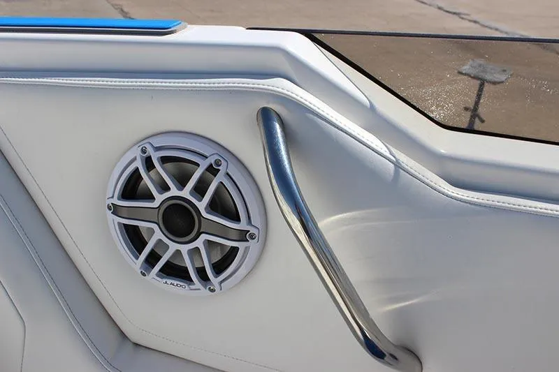 Slide: The Image of Close-up of a 2000 Fountain 32 Fever boat speaker and handrail. - 40