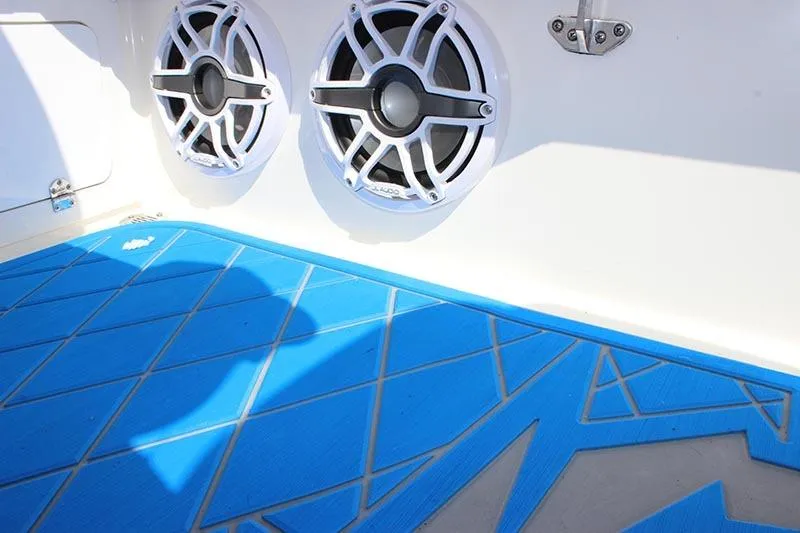 Slide: The Image of Blue deck with speakers on a 2000 Fountain 32 Fever boat. - 44