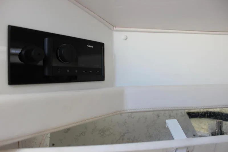 Slide: The Image of Interior of 2000 Fountain 32 Fever boat with modern audio system. - 56