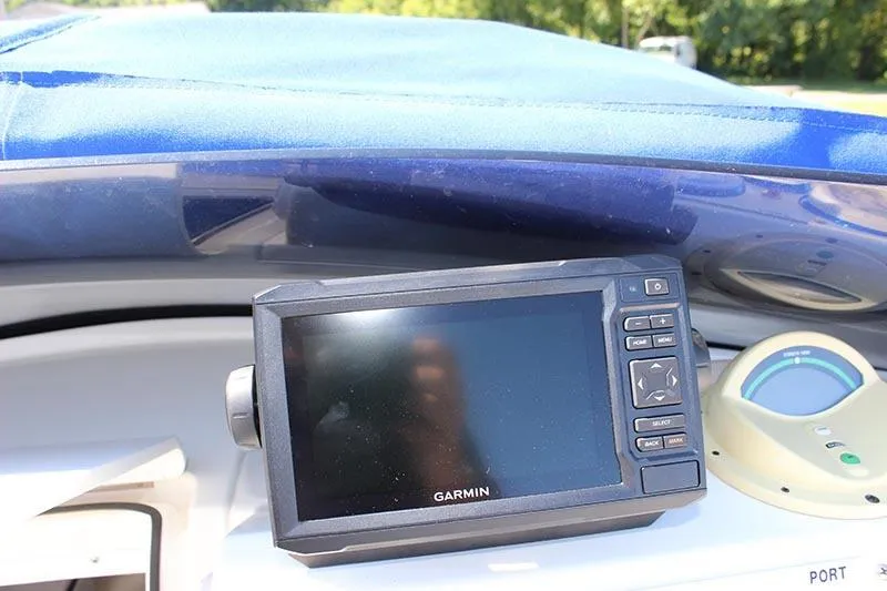Slide: The Image of Garmin GPS device on 2000 Fountain 32 Fever boat dashboard. - 6