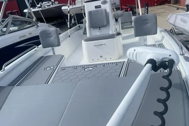 Slide: The Image of Avid 23 Fusion 2021 boat interior with seating and deck view. - 5