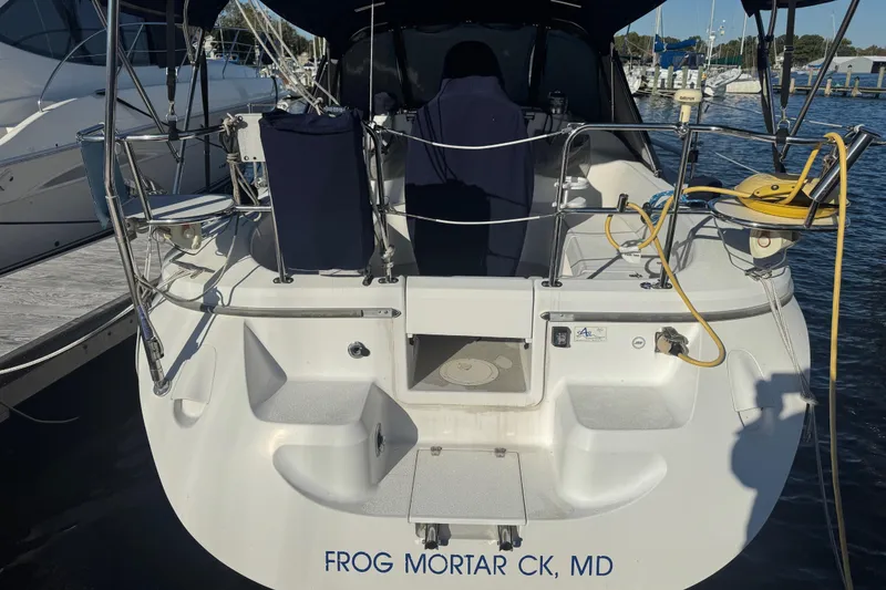 Slide: The Image of 2006 Catalina 309 sailboat docked at Frog Mortar Creek, Maryland marina. - 18