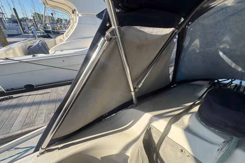 Slide: The Image of Interior view of a 2006 Catalina 309 sailboat with stainless steel supports. - 53