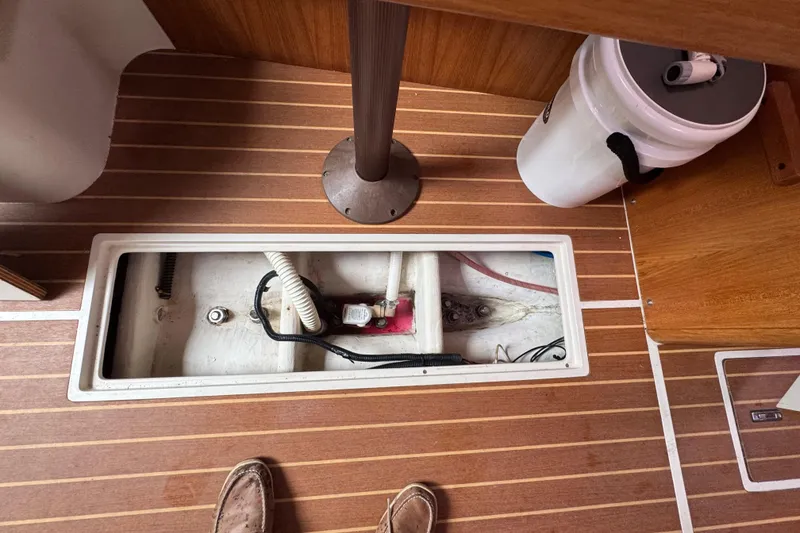 Slide: The Image of Open hatch on Catalina 309 sailboat, revealing interior components, 2006 model. - 74