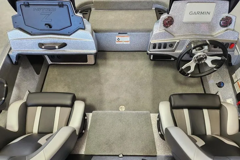 Slide: The Image of Interior of 2026 Nitro Z18 Pro boat with Garmin dashboard and dual seats. - 11