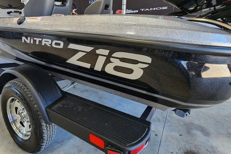 Slide: The Image of 2026 Nitro Z18 Pro boat on trailer, showcasing sleek design and branding. - 4