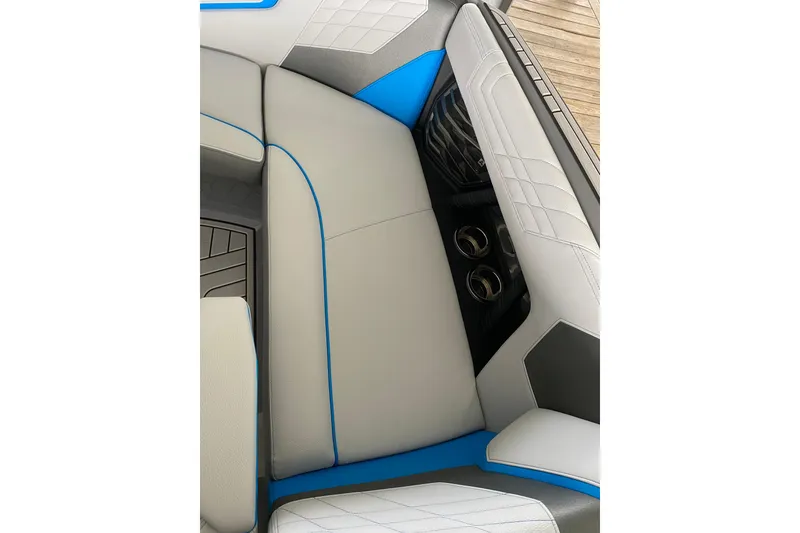 Slide: The Image of 2022 Nautique Super Air Nautique G23 cruising on a scenic lake. - 5