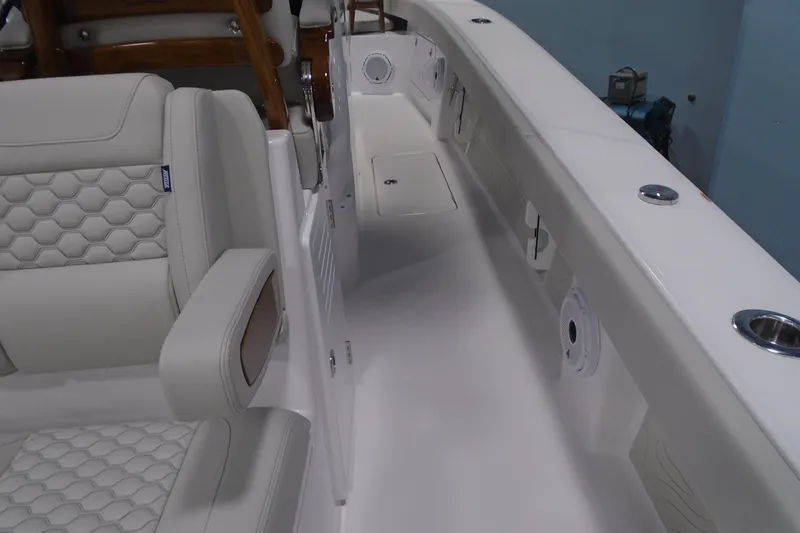 Slide: The Image of Luxurious interior of 2026 Jupiter 32 boat with white seating and modern design. - 13