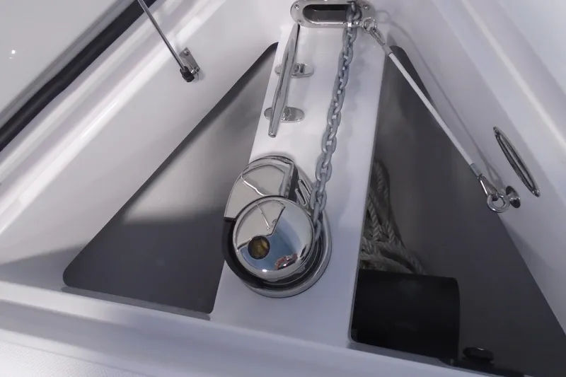 Slide: The Image of Anchor locker of 2026 Jupiter 32 boat with chain and winch. - 17