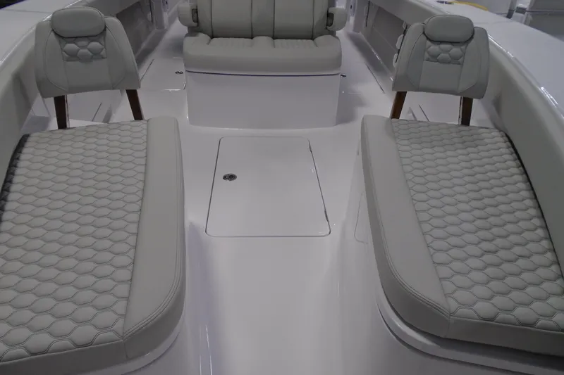 Slide: The Image of Luxurious seating on 2026 Jupiter 32 boat with elegant upholstery design. - 19