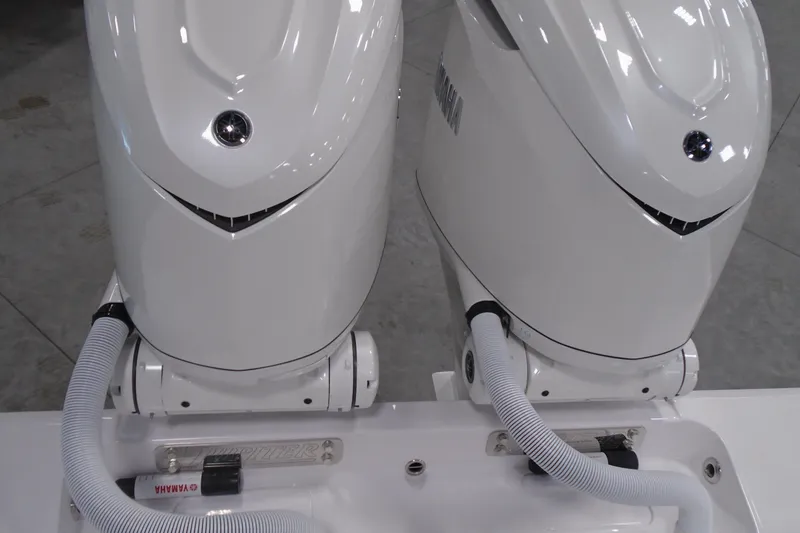 Slide: The Image of Twin Yamaha outboard motors on a Jupiter 32 boat, 2026 model. - 29
