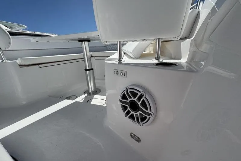 Slide: The Image of 2026 Sportsman Heritage 261 Center Console interior with speaker and seating detail. - 11