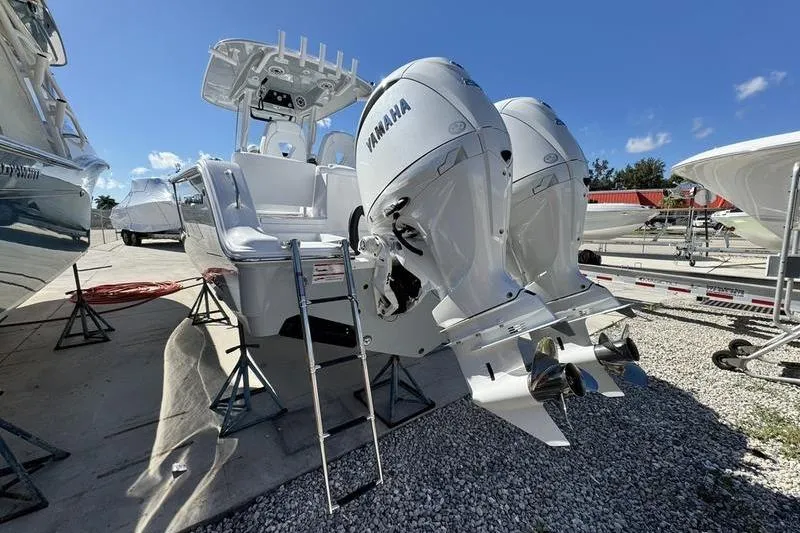 Slide: The Image of 2026 Sportsman Heritage 261 Center Console with twin Yamaha outboard engines on display. - 3