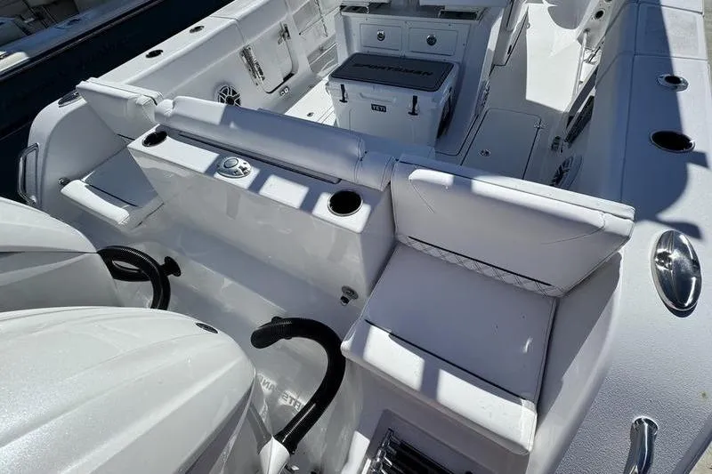 Slide: The Image of 2026 Sportsman Heritage 261 Center Console boat interior with seating and storage. - 39