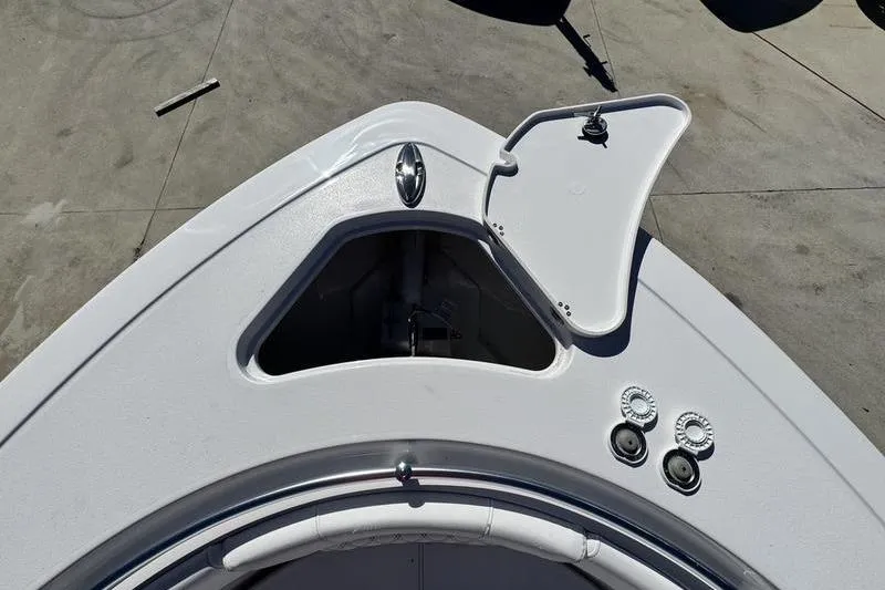 Slide: The Image of Bow of 2026 Sportsman Heritage 261 Center Console with open storage compartment. - 5