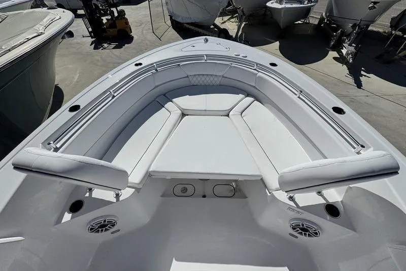 Slide: The Image of 2026 Sportsman Heritage 261 Center Console boat with spacious seating and sleek design. - 6