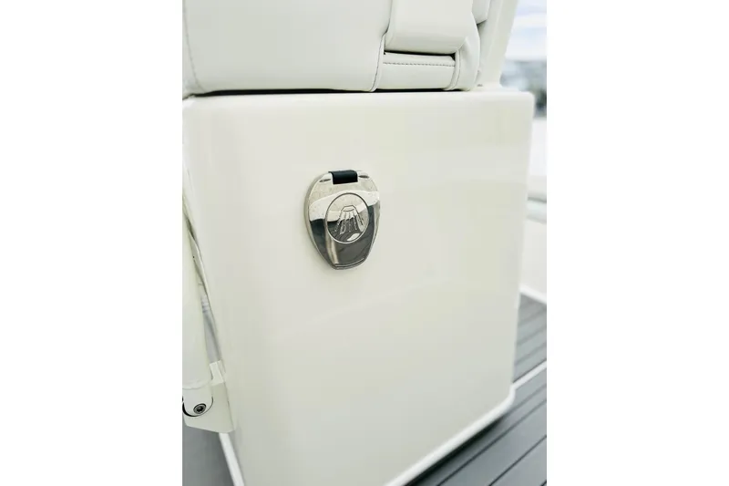 Slide: The Image of 2025 Pathfinder 2600 TRS boat detail, featuring sleek white seating and chrome hardware. - 19