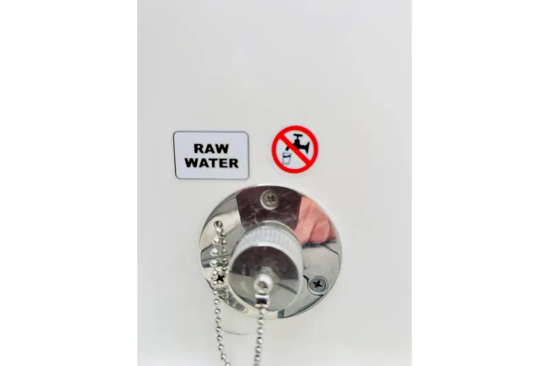 Slide: The Image of Pathfinder 2600 TRS 2025 raw water inlet with warning label. - 21