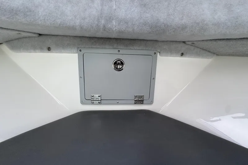 Slide: The Image of Interior storage compartment of 2026 Defiance Admiral 220 EX boat. - 52