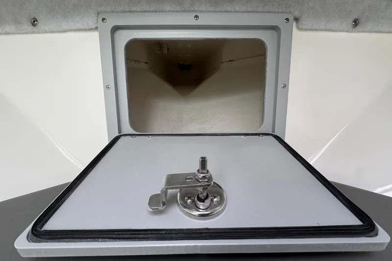 Slide: The Image of Hatch of 2026 Defiance Admiral 220 EX boat, featuring secure latch mechanism. - 53
