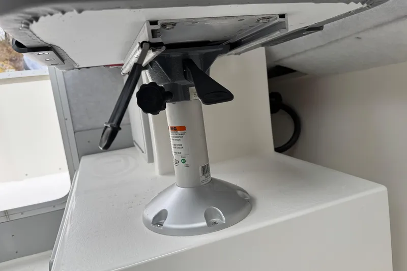 Slide: The Image of Boat seat pedestal in 2026 Defiance Admiral 220 EX cabin interior. - 57