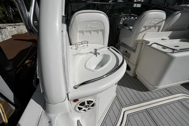 Slide: The Image of 2006 Sea Ray 340 Sundancer boat interior with sink and seating area. - 19