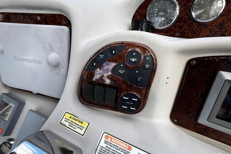 Slide: The Image of Control panel of a 2006 Sea Ray 340 Sundancer boat with Raymarine equipment. - 26