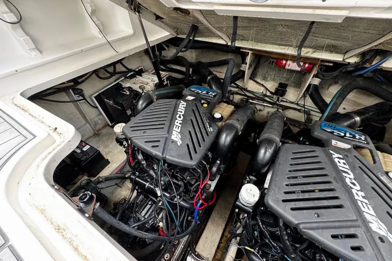 Slide: The Image of Engine compartment of 2006 Sea Ray 340 Sundancer with twin MerCruiser engines. - 47
