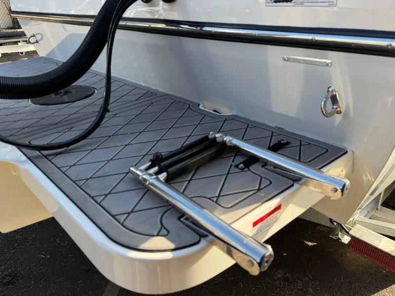 Slide: The Image of Swim platform with ladder on 2025 Defiance Admiral 220 EX boat. - 16