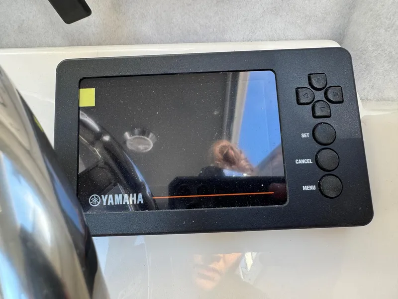 Slide: The Image of Yamaha display on 2025 Defiance Admiral 220 EX boat dashboard. - 49