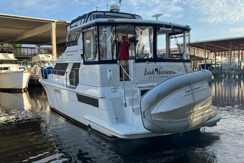 Slide: The Image of 1998 Carver 445 Aft Cabin Motor Yacht docked, named "Irish Hurricane," St. Petersburg, FL. - 2
