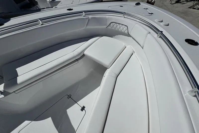 Slide: The Image of 2026 Sportsman Open 262 Center Console boat with spacious seating area. - 10