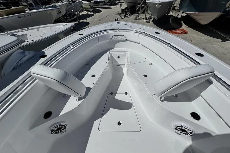 Slide: The Image of 2026 Sportsman Open 262 Center Console boat interior with seating and storage compartments. - 5