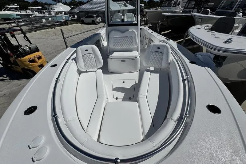 Slide: The Image of 2026 Sportsman Open 262 Center Console boat with spacious seating and modern design. - 8
