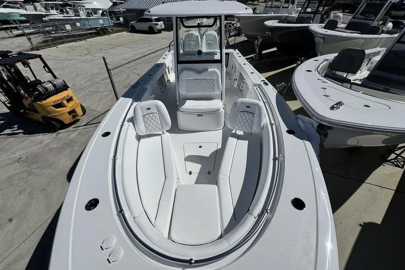 Slide: The Image of 2026 Sportsman Open 262 Center Console boat with spacious seating and modern design. - 9