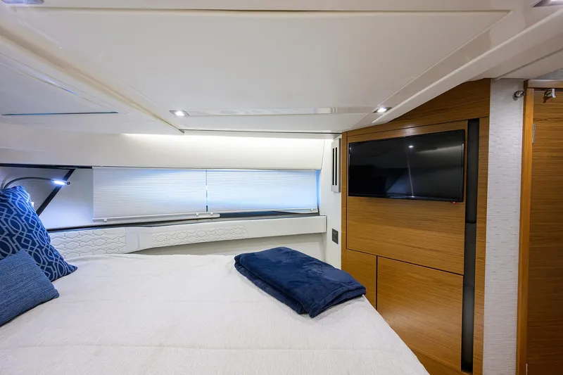 Slide: The Image of Luxurious cabin interior of 2022 Tiara Yachts 43 LE with modern amenities and elegant design. - 45