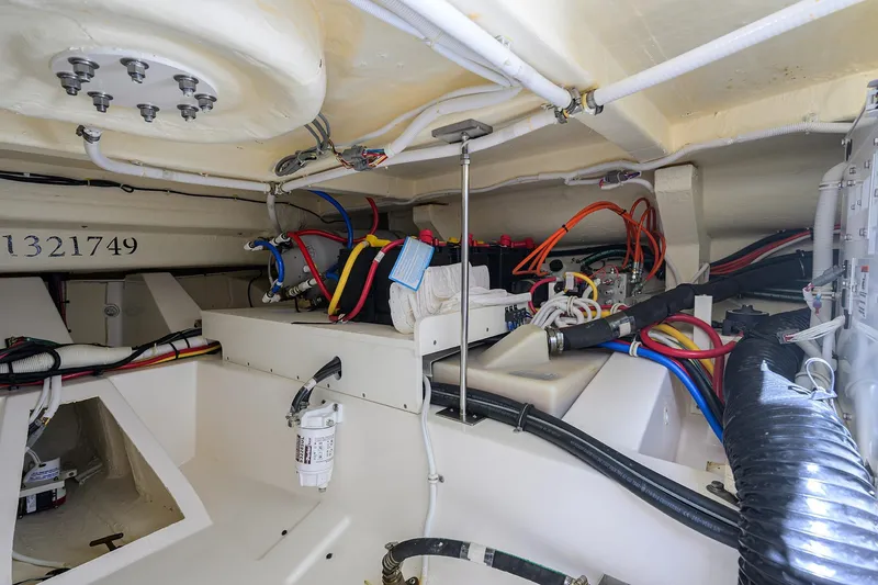 Slide: The Image of Engine room of 2022 Tiara Yachts 43 LE with wiring and components. - 57