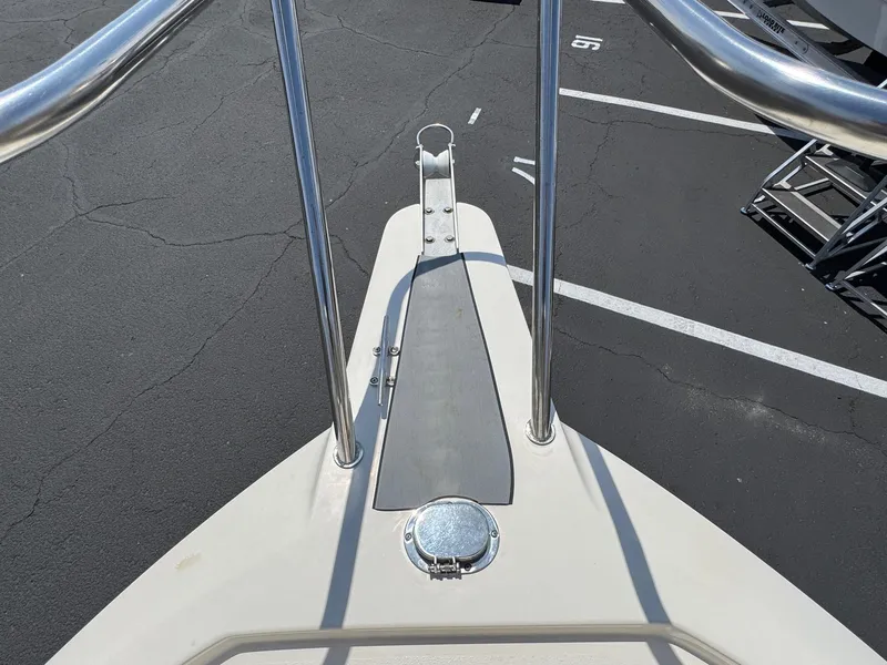 Slide: The Image of 2023 Defiance Admiral 220 EX boat docked, featuring a sturdy cabin and sleek design. - 50