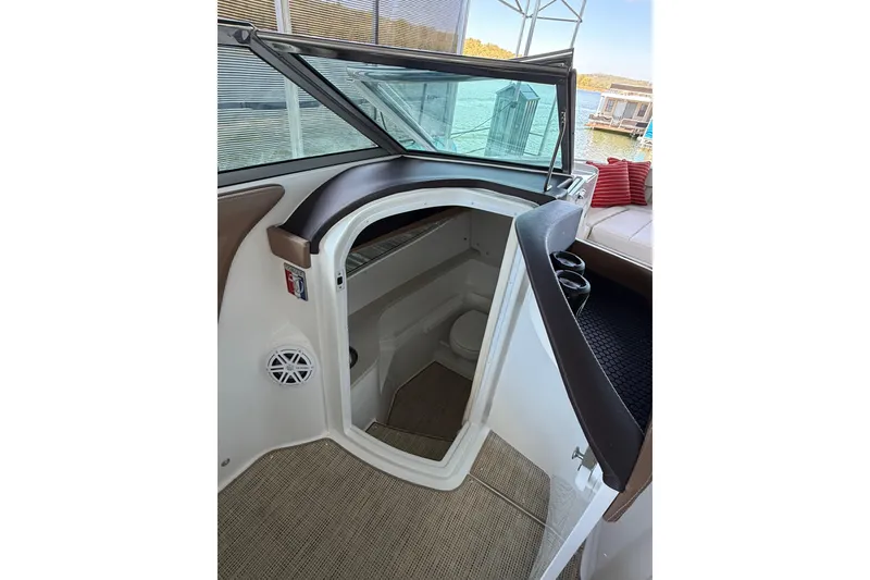 Slide: The Image of Control panel of 2018 Cobalt R35 boat with joystick and throttle levers. - 11