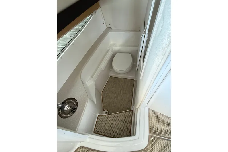 Slide: The Image of 2018 Cobalt R35 boat bathroom interior with sink and toilet. - 20
