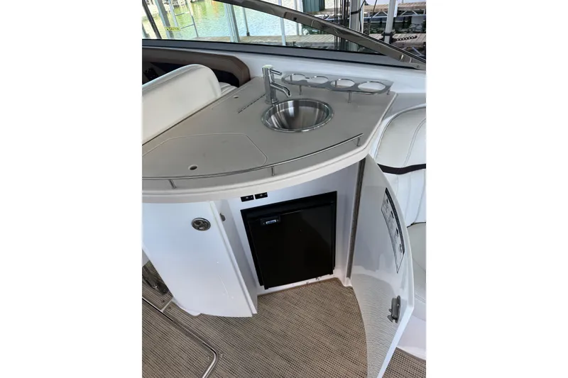 Slide: The Image of 2018 Cobalt R35 boat docked, showcasing sleek design and modern features. - 4