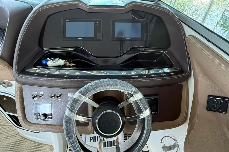 Slide: The Image of Luxurious interior of a 2018 Cobalt R35 boat with plush seating and elegant design. - 6